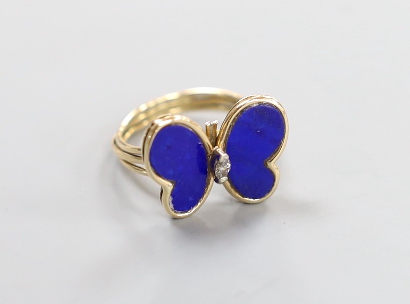 A yellow metal, lapis lazuli and diamond set 'butterfly' ring, size I, gross weight 2.6 grams.